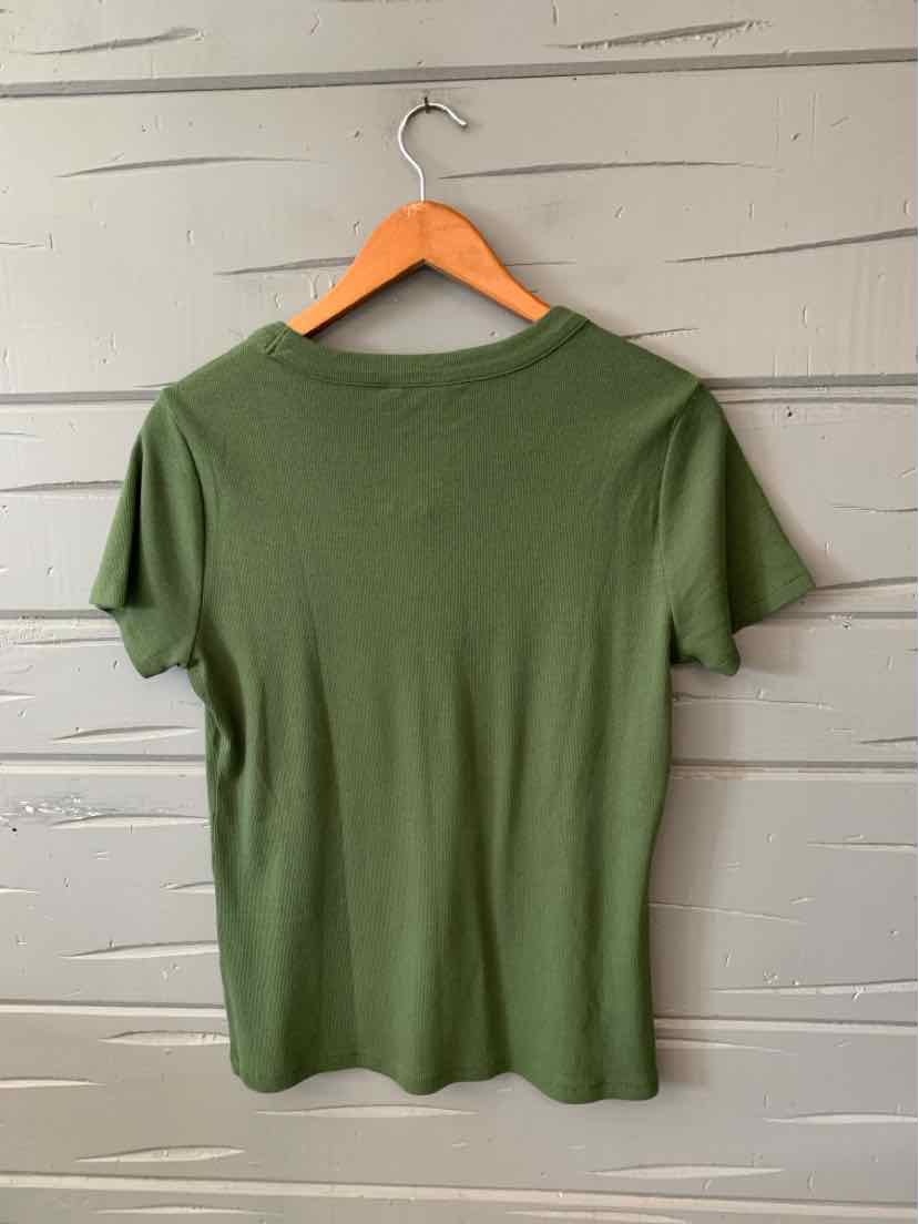 Olive green short-sleeve crew neck shirt with a fitted silhouette, hanging on a wooden hanger.
