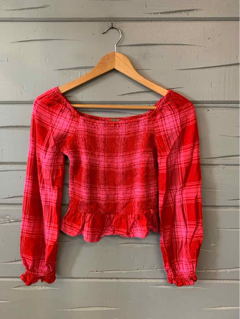 Red plaid long-sleeve smocked top with square neckline and ruffled hem in size XS.