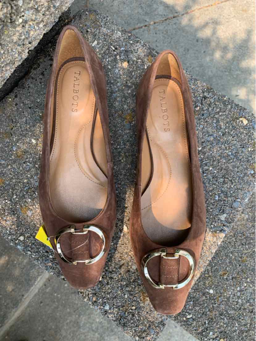 Brown suede pointed-toe flats with large gold buckle detail on vamp, size 7.