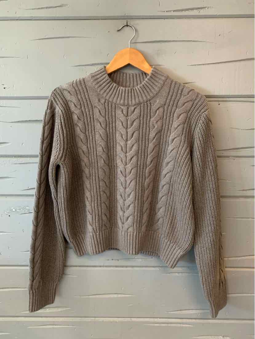 Taupe cable knit sweater with crew neck and long sleeves, medium size, cozy textured pattern.