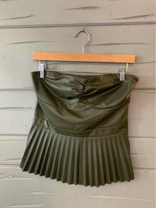 Olive green faux leather mini skirt with pleated hem and ruched waistband.