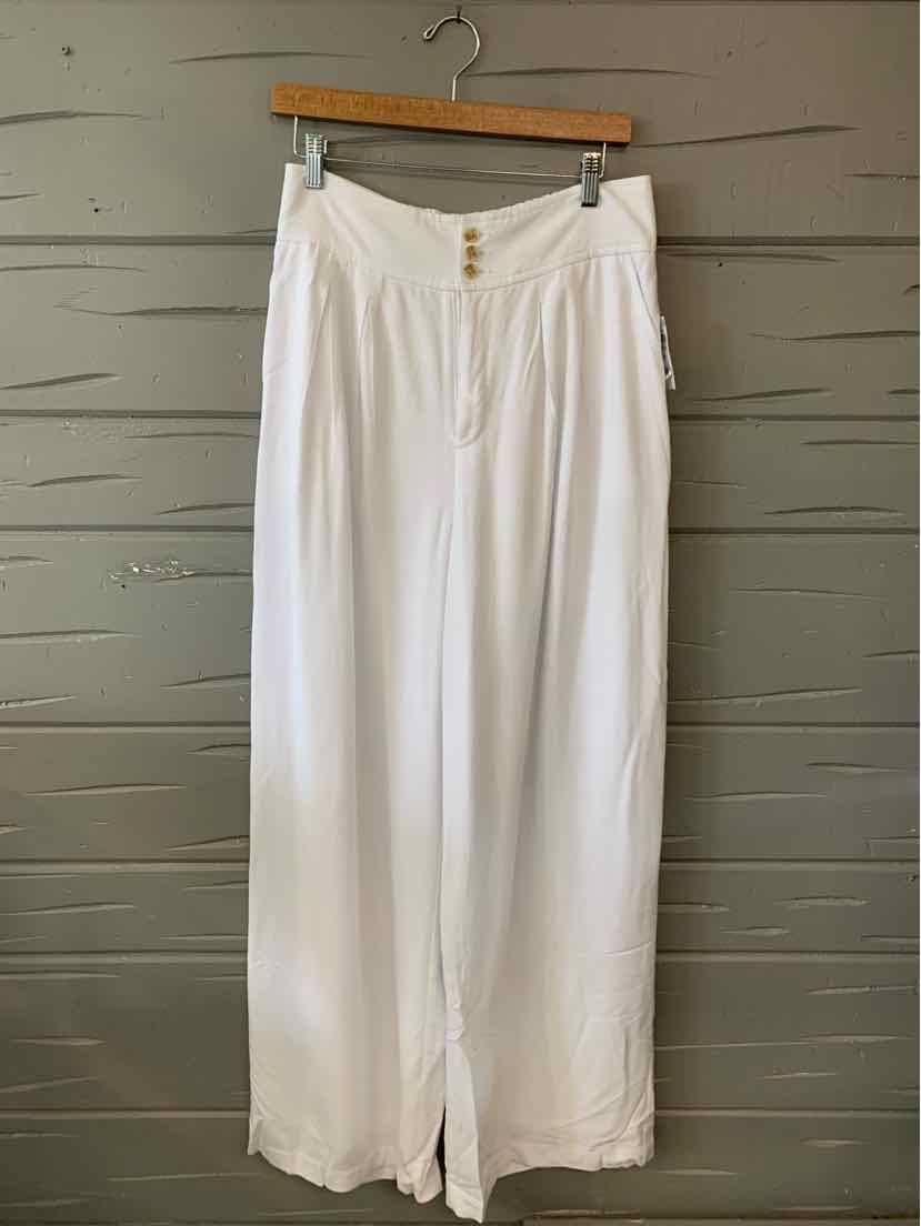 White wide-leg pants with high waist and button detail, size 8.