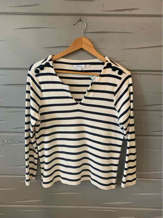 White long-sleeve shirt with navy horizontal stripes and a V-neck on wooden hanger.