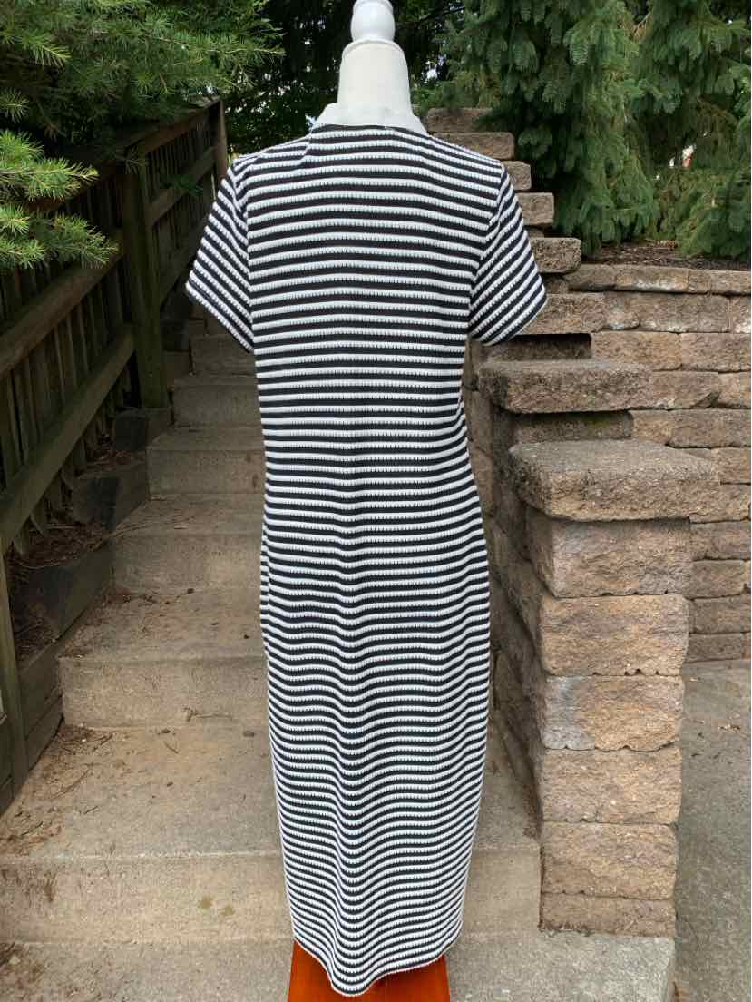 Black and white horizontal striped short-sleeve midi dress with a straight silhouette.