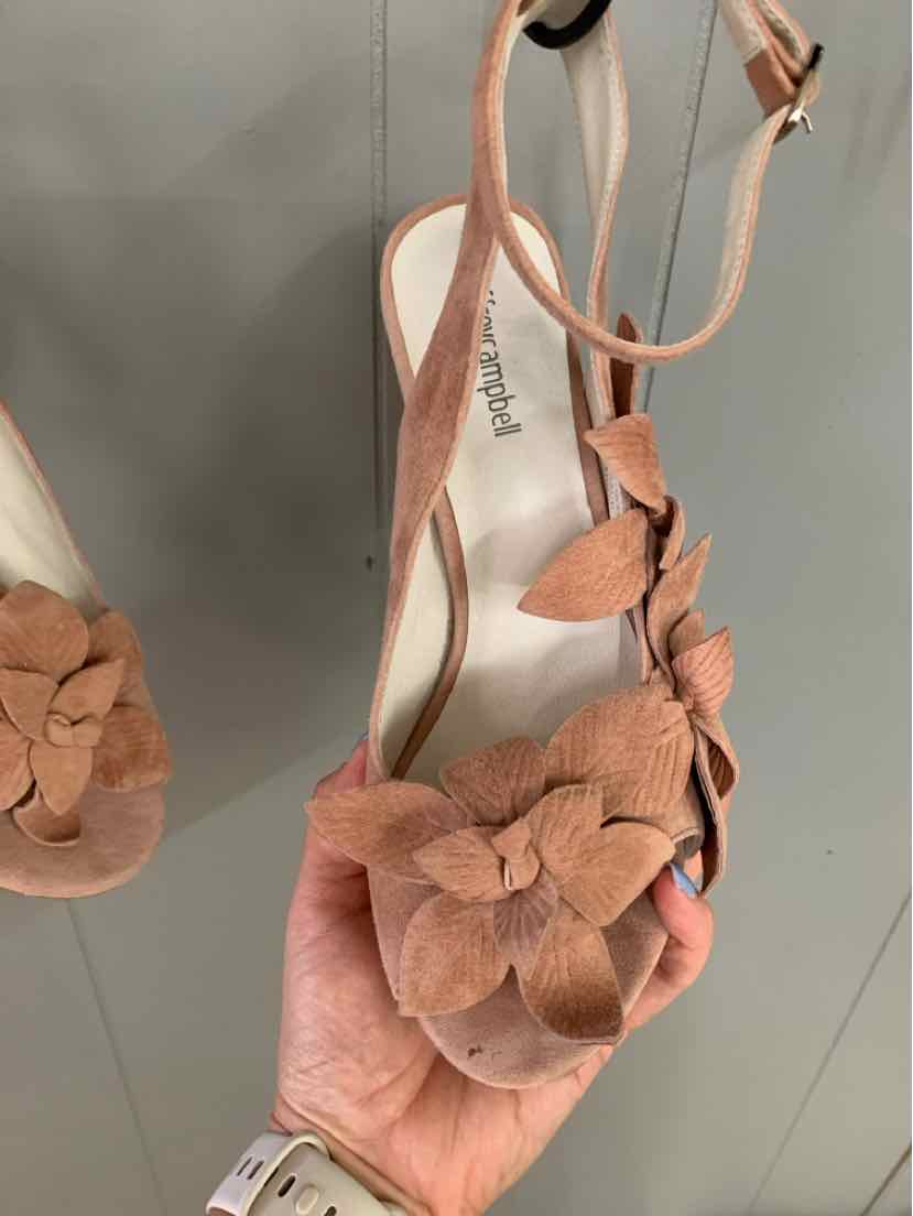 Tan suede open-toe sandal with floral appliqué and ankle strap, size 9.5.