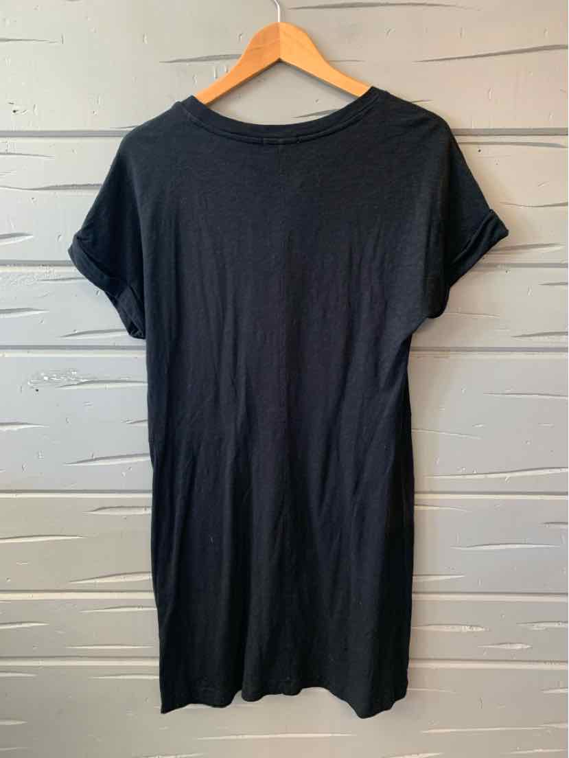 Black short-sleeve casual dress with a round neckline and relaxed fit on a wooden hanger.