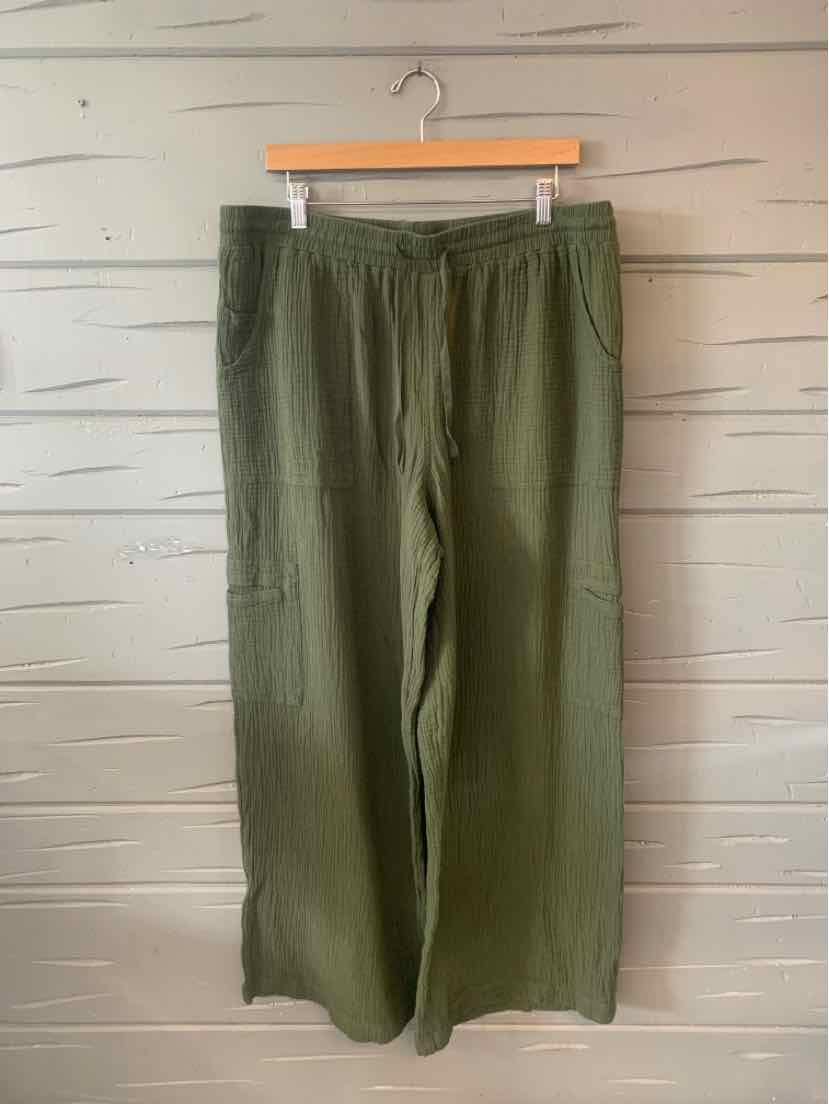 Olive green wide-leg pants with an elastic waistband and side pockets, size 18.
