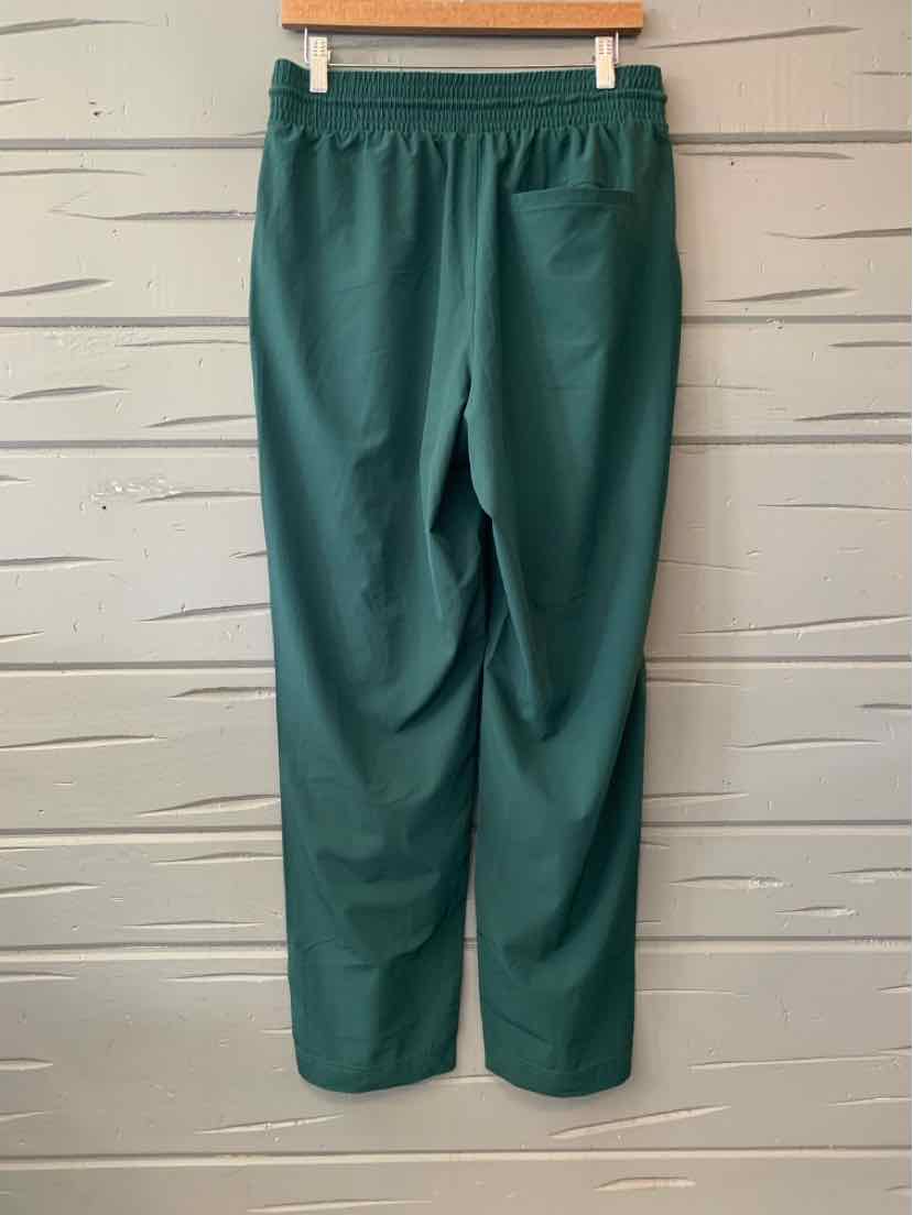 Dark green straight-leg athletic pants with elastic waistband, size medium.