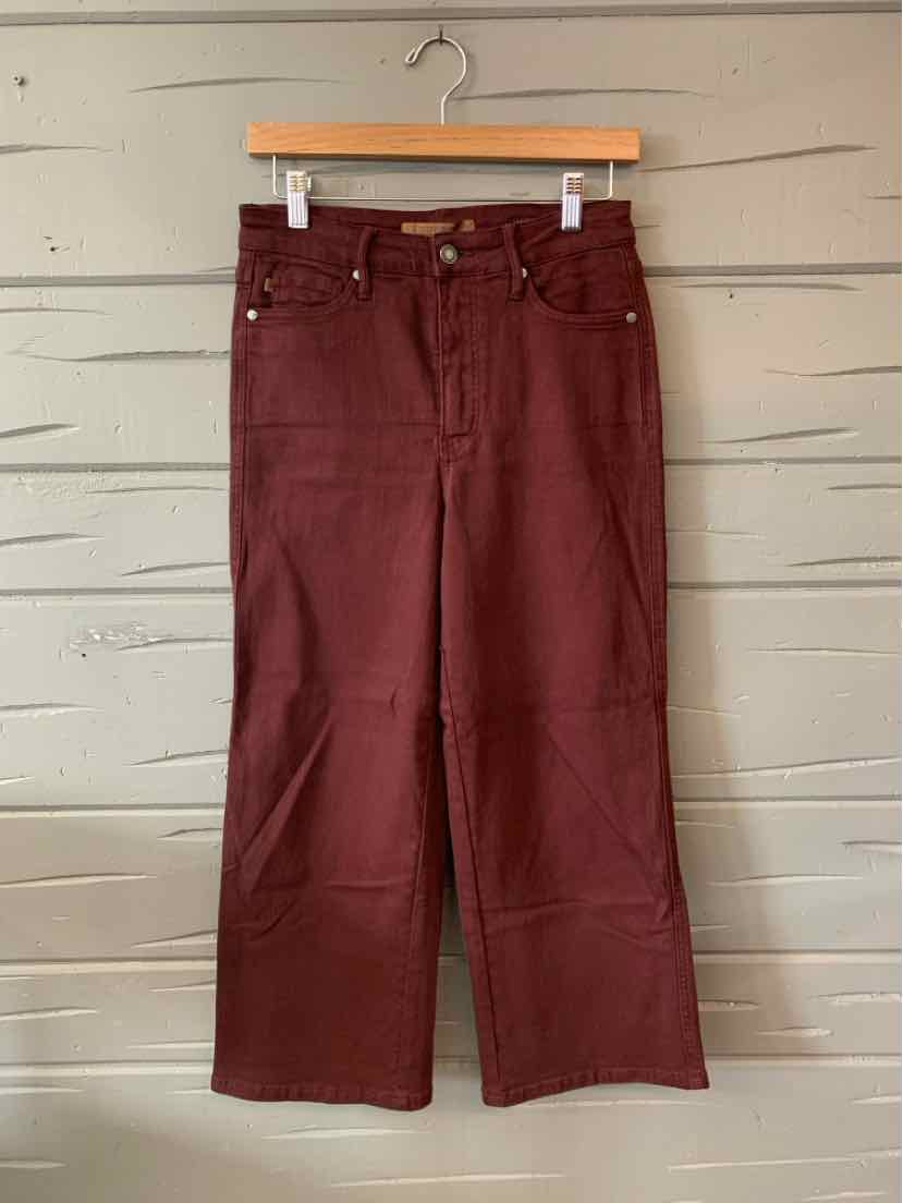 Burgundy high-waist wide-leg jeans with front and back pockets, button, and zipper closure.