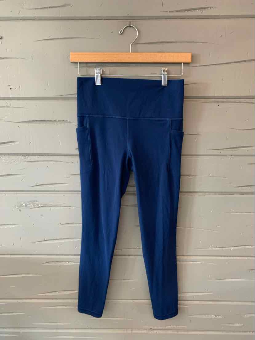 Navy blue high-waisted athletic leggings with a smooth, solid fabric in size small.