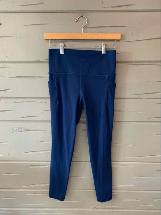 Navy blue high-waisted athletic leggings with a smooth, solid fabric in size small.