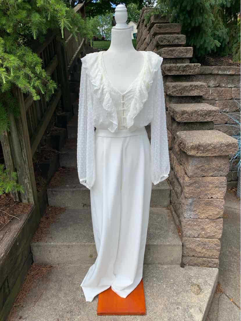 White lace long-sleeve maxi dress with ruffled V-neck and fitted waist.