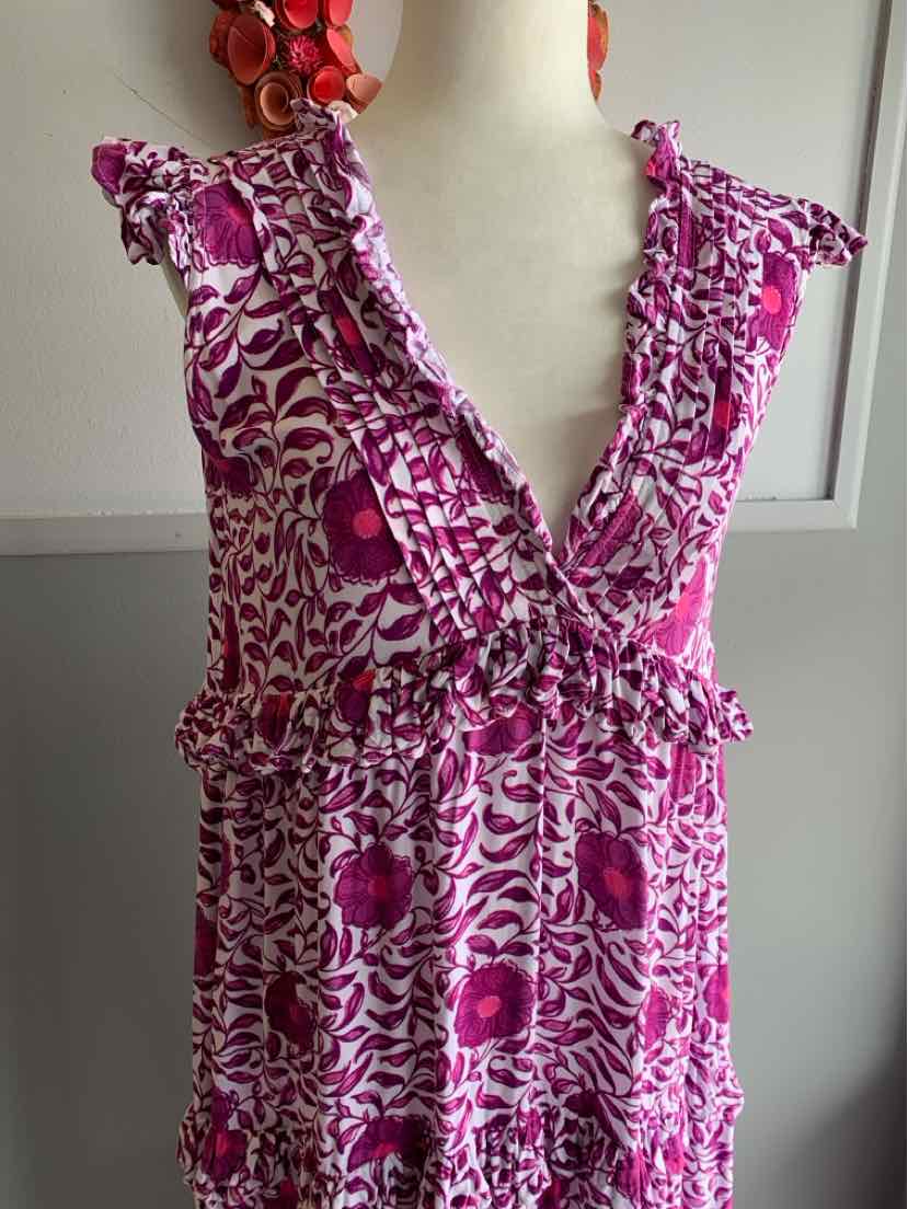 Sleeveless floral print dress in pink and white with ruffled V-neck and tie waist in size small.