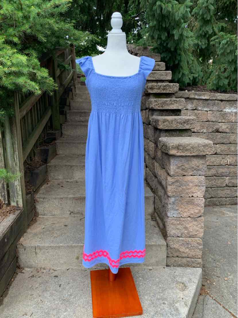 Blue sleeveless dress with square neckline and smocked bodice, pink scalloped trim at hem.