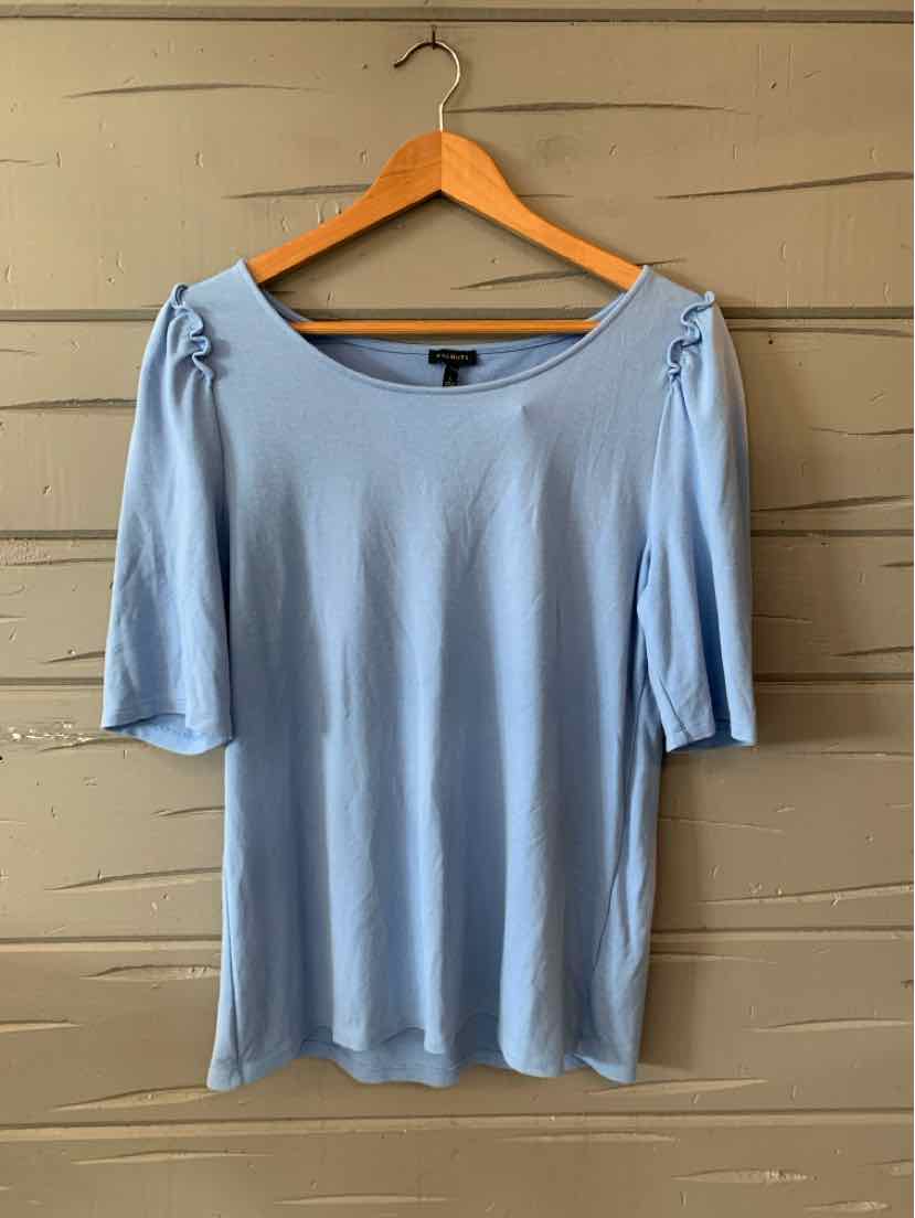 Light blue short-sleeve blouse with slight puff shoulder detail and scoop neckline on wooden hanger.