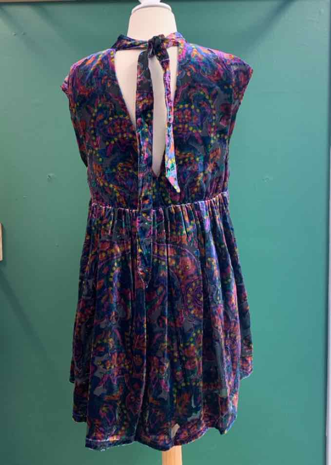 Sleeveless multi paisley print dress with gathered waist and back tie neckline in size small.