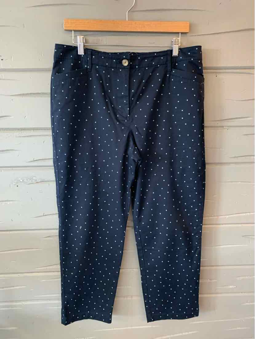 Navy blue pants with white polka dots, button and zipper front, straight leg cut, size 12.