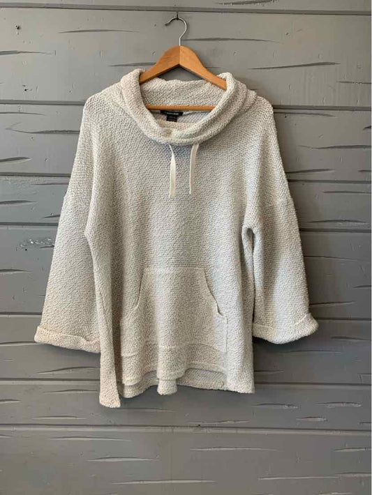 Beige textured pullover hoodie with a draped cowl neck, drawstrings, and front kangaroo pocket.