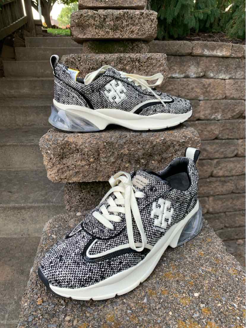 Black and white tweed Tory Burch sneakers with white laces and thick white soles, size 10.