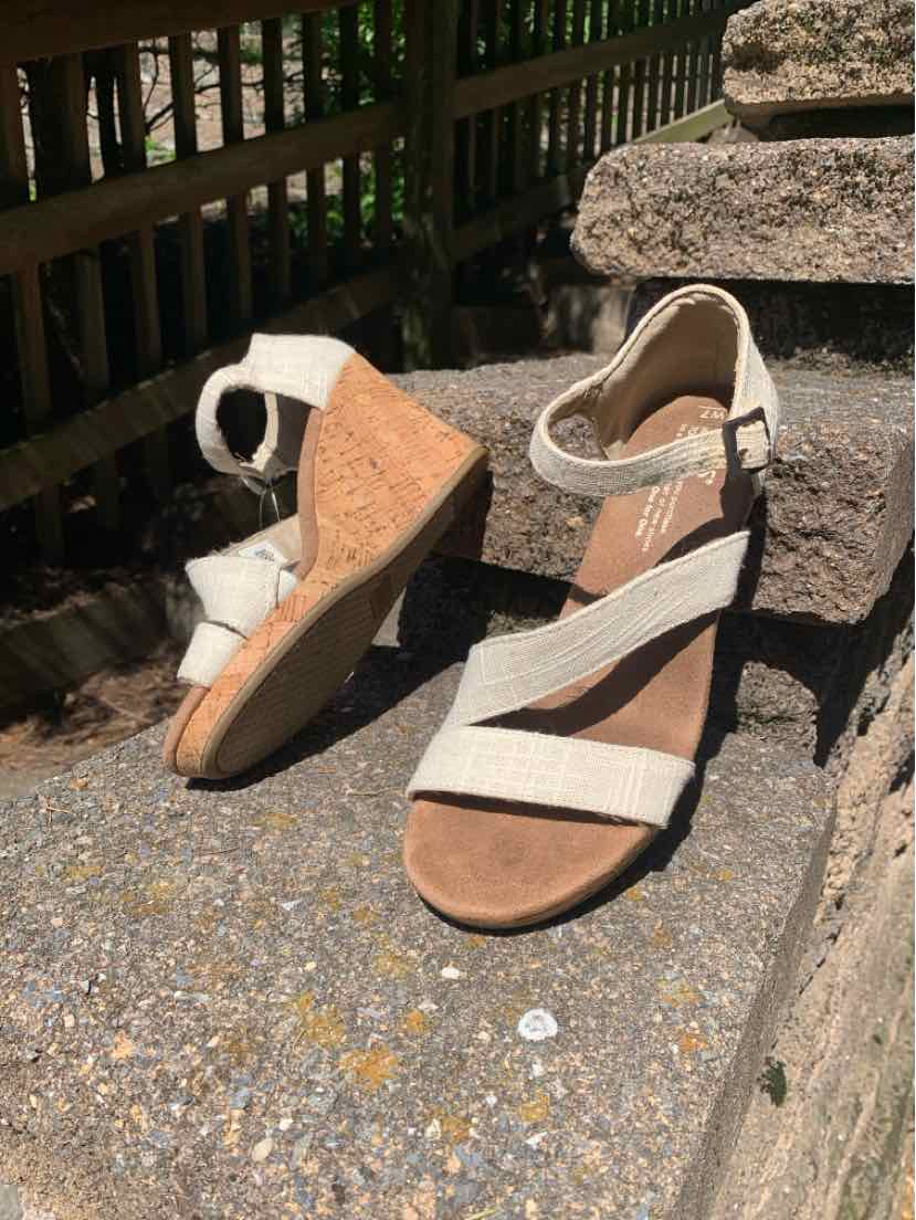 Beige wedge sandals with ankle strap and cork platform sole, size 7, casual summer style.