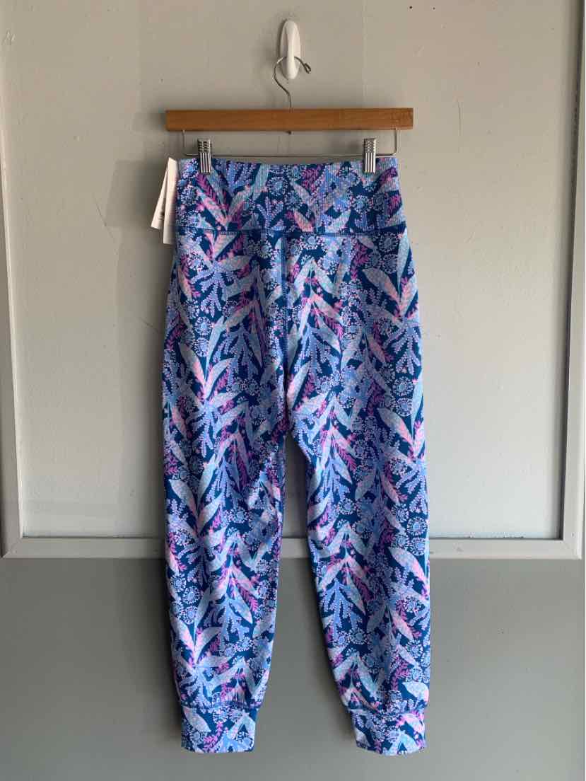 Blue starfish-print casual pants with elastic waistband and cuffed ankles.