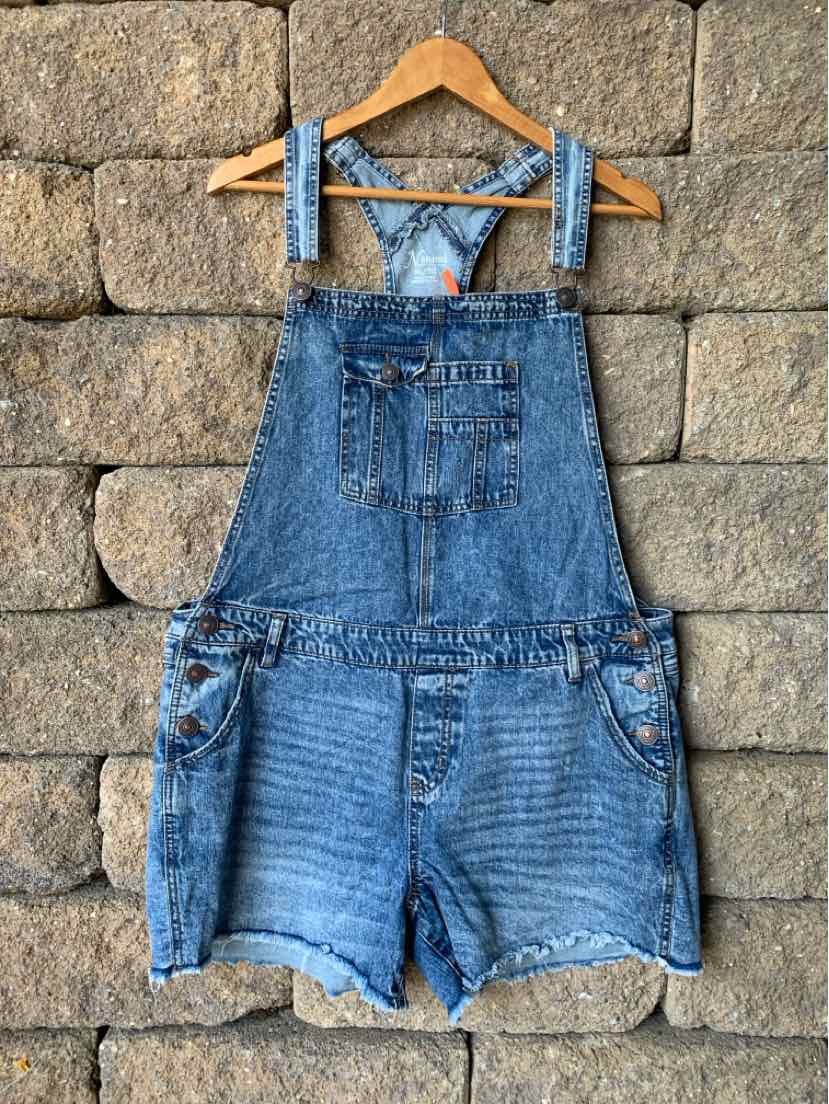 Blue denim overall shorts with adjustable shoulder straps, front chest pocket, and frayed hem.
