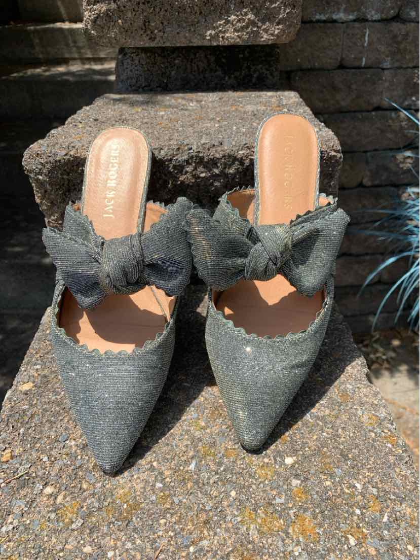 Gray pointed-toe slip-on flats with large fabric bow accents and scalloped edges.
