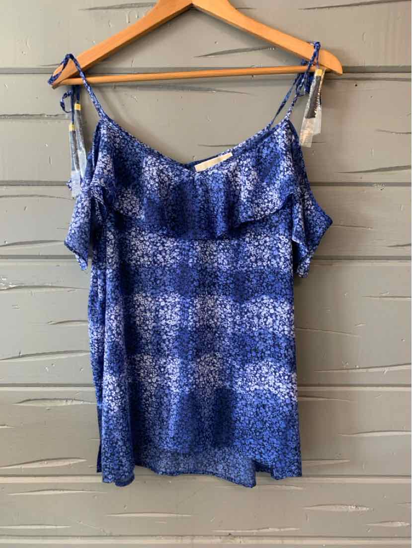 Blue floral sleeveless blouse with ruffled neckline and spaghetti ties, size large.