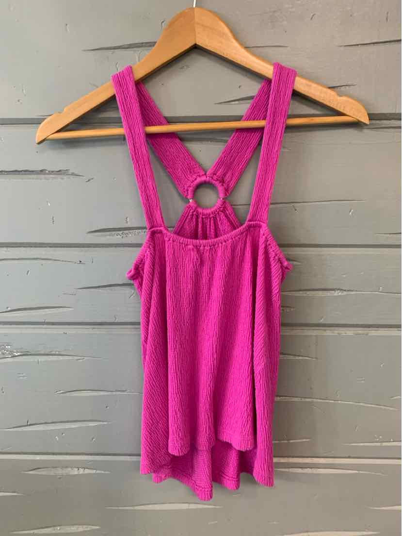 Bright pink sleeveless tank top with ring detail on back straps, flowy fabric, size XS.
