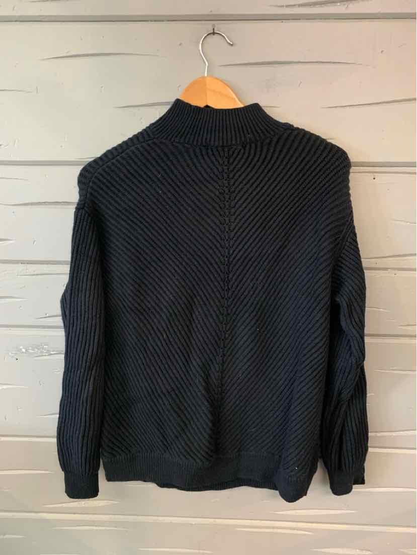 Black textured knit sweater with long sleeves and a mock neck, medium size hanging on wooden hanger.