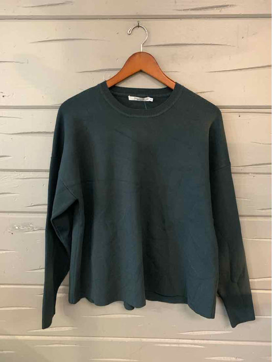 Dark gray long-sleeve crewneck sweatshirt with relaxed fit and ribbed cuffs and hem.