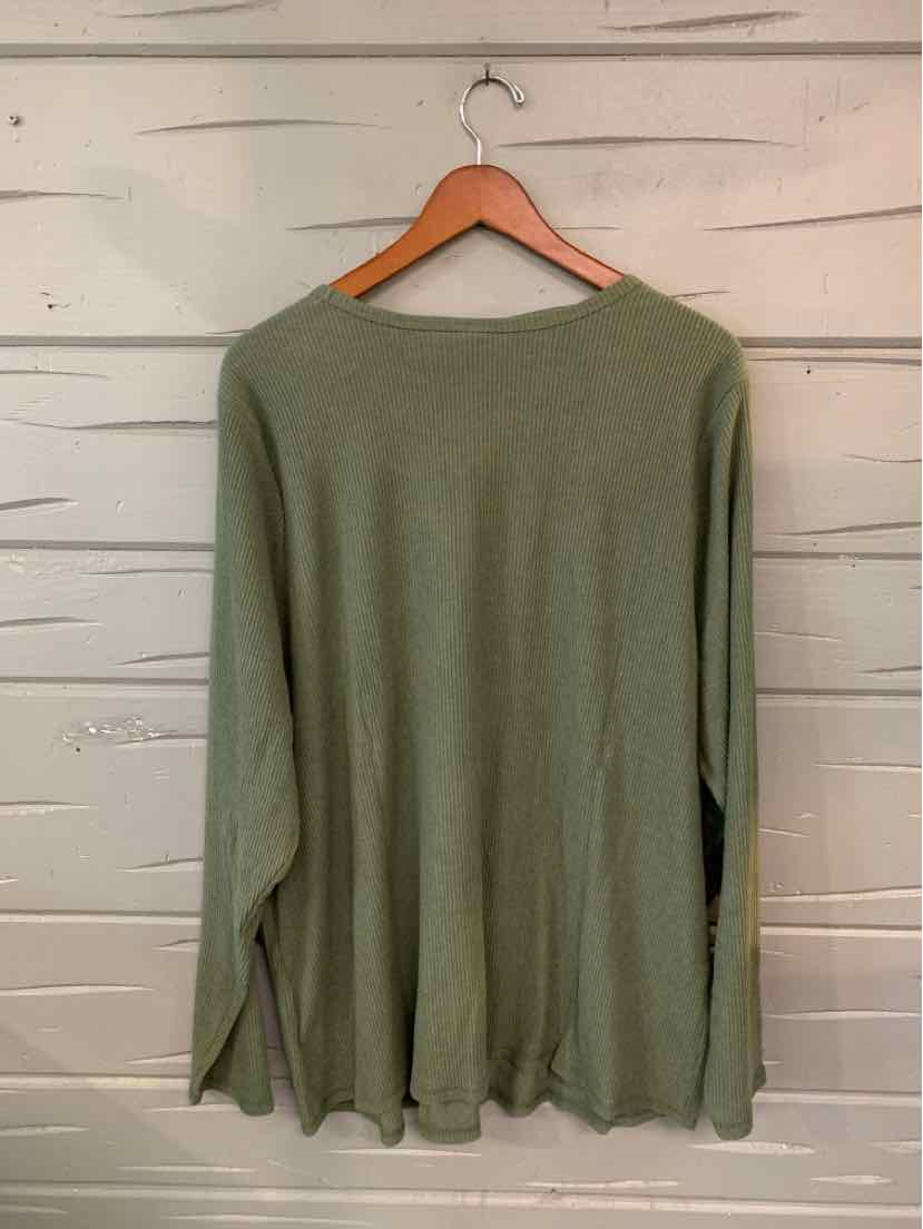 Long-sleeve olive green knit top with loose fit and soft fabric on wooden hanger.