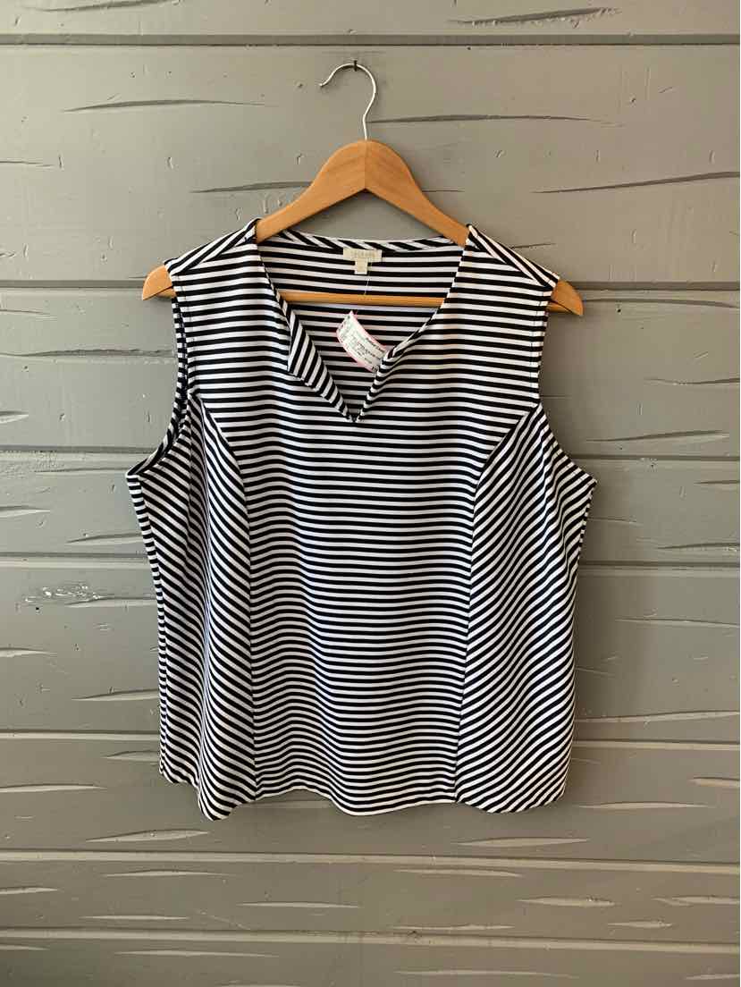 Sleeveless black and white striped blouse with V-neck on wooden hanger.