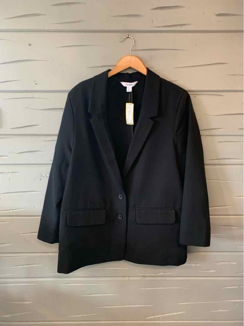 Black tailored blazer with notch lapels, single-button closure, and front flap pockets, size XL.