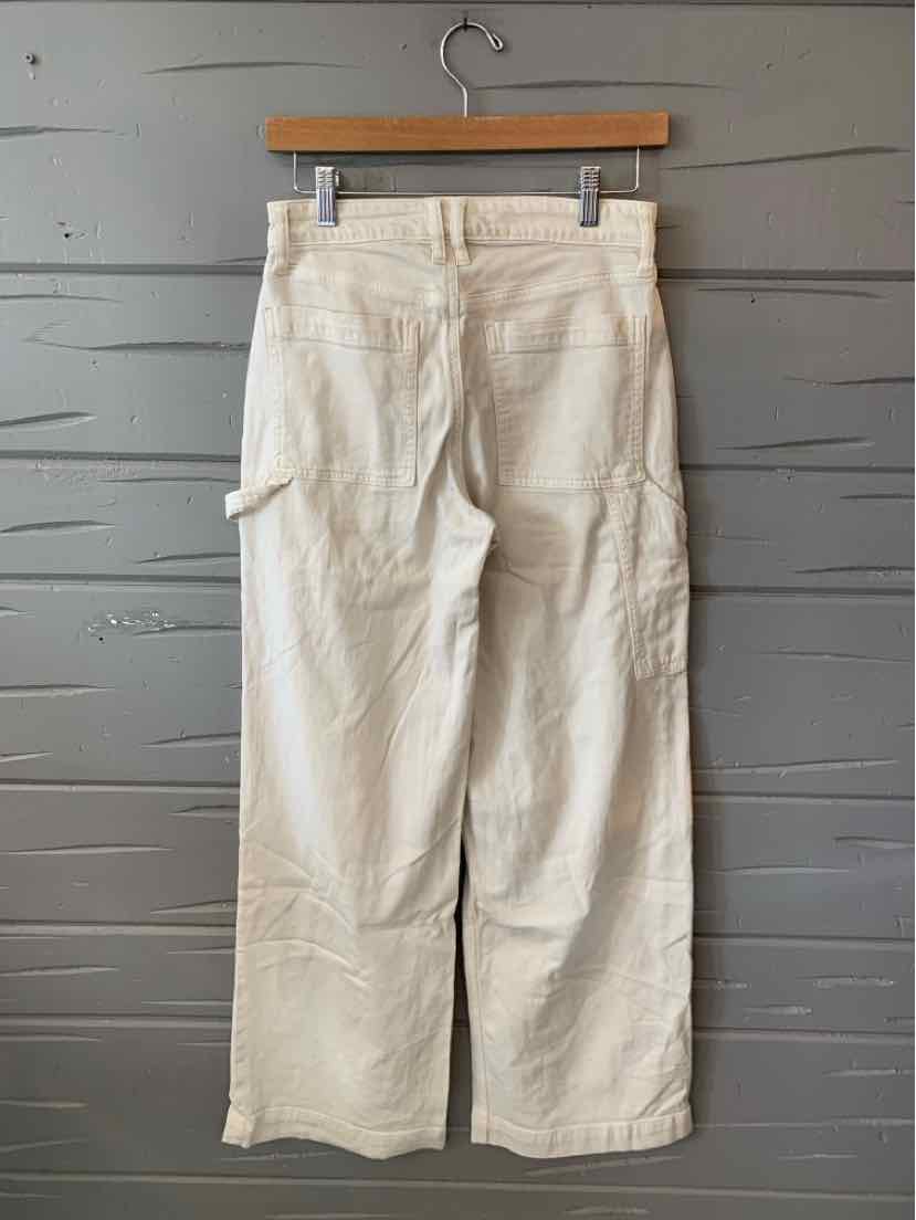 Off-white straight-leg pants with multiple pockets and a relaxed fit, size 2.
