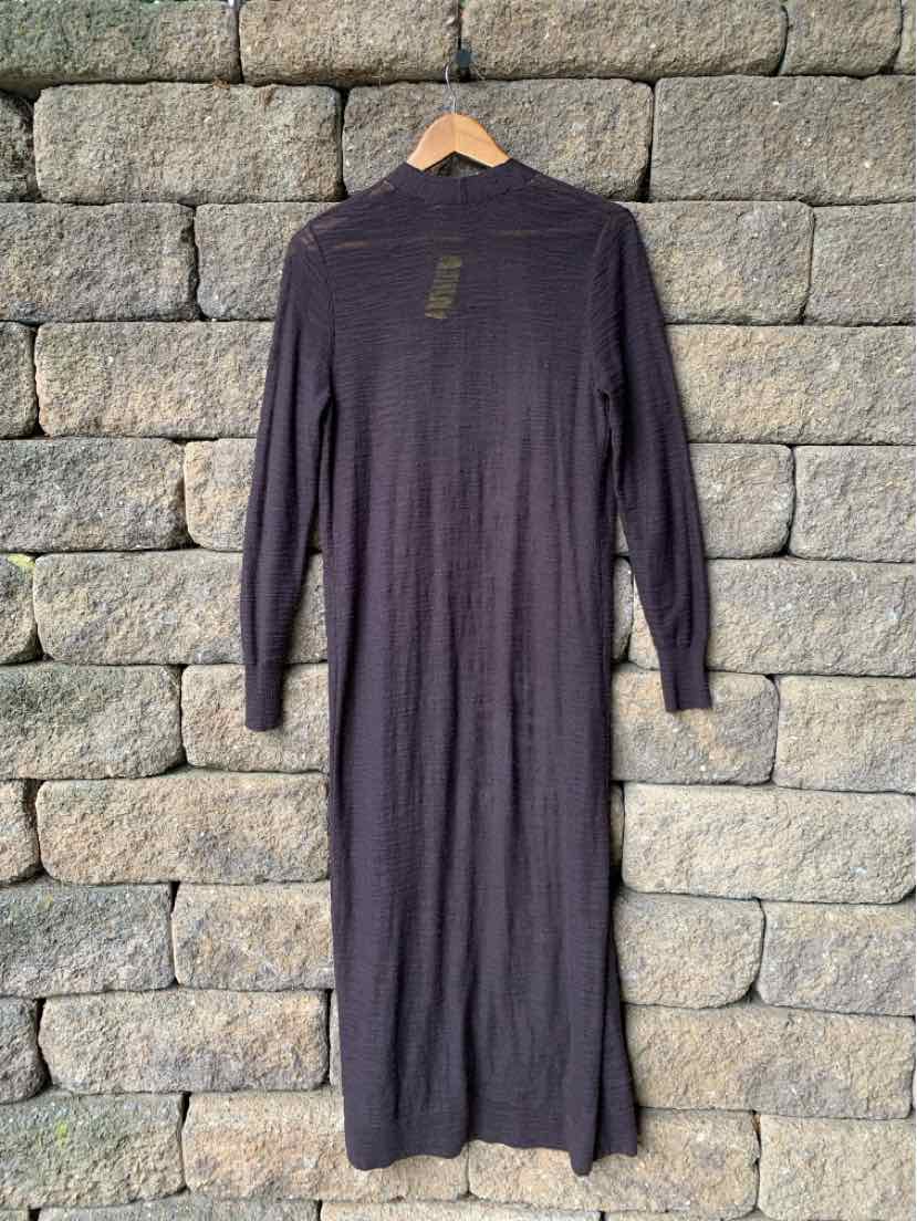 Long-sleeve dark gray ribbed knit dress with a fitted silhouette hanging on wooden hanger.