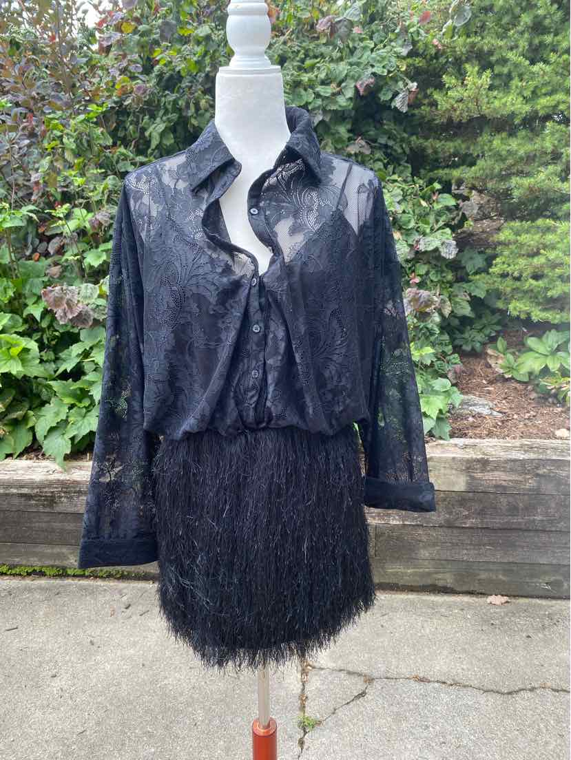 Black lace long-sleeve dress with ruffled collar and textured feathered skirt, size small.