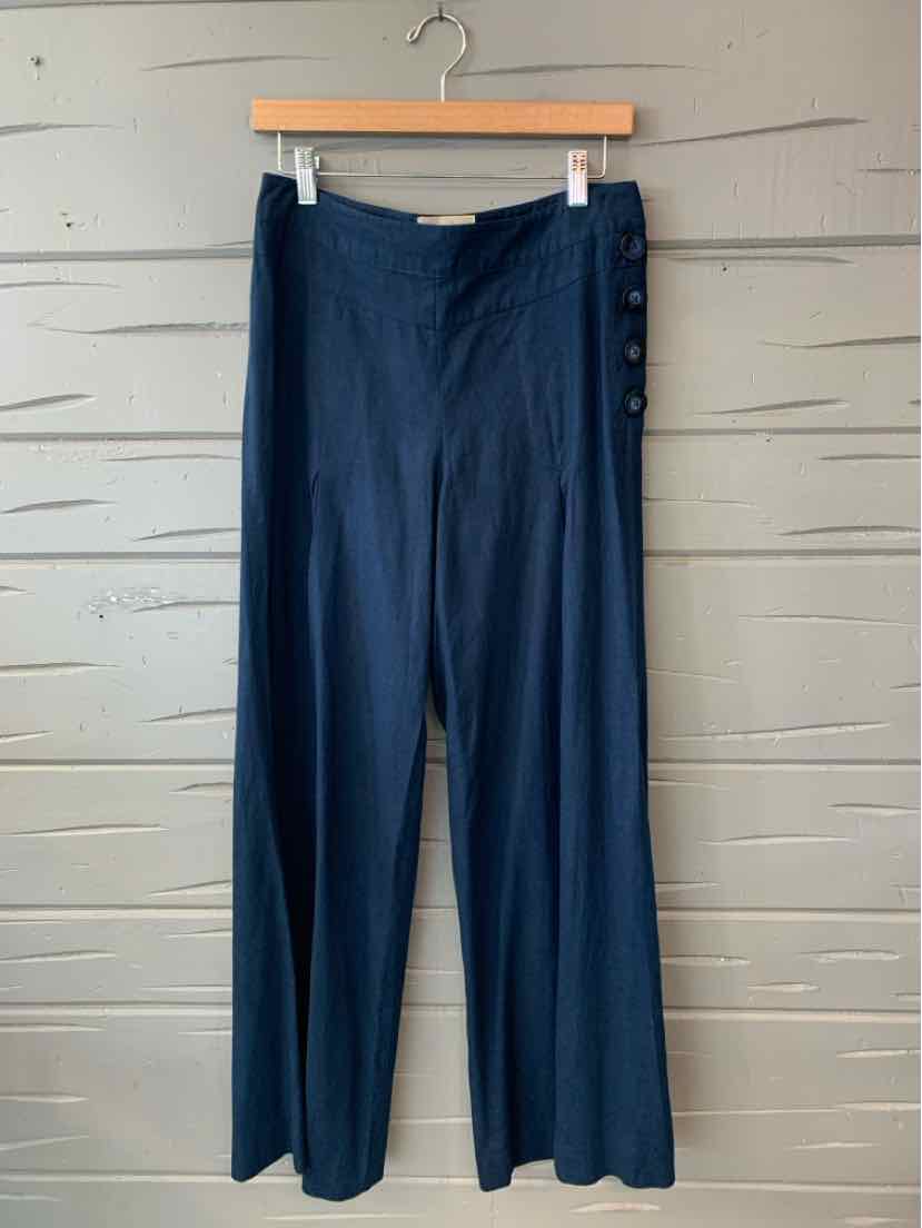 Navy blue wide-leg pants with button details on the side waist, lightweight fabric.