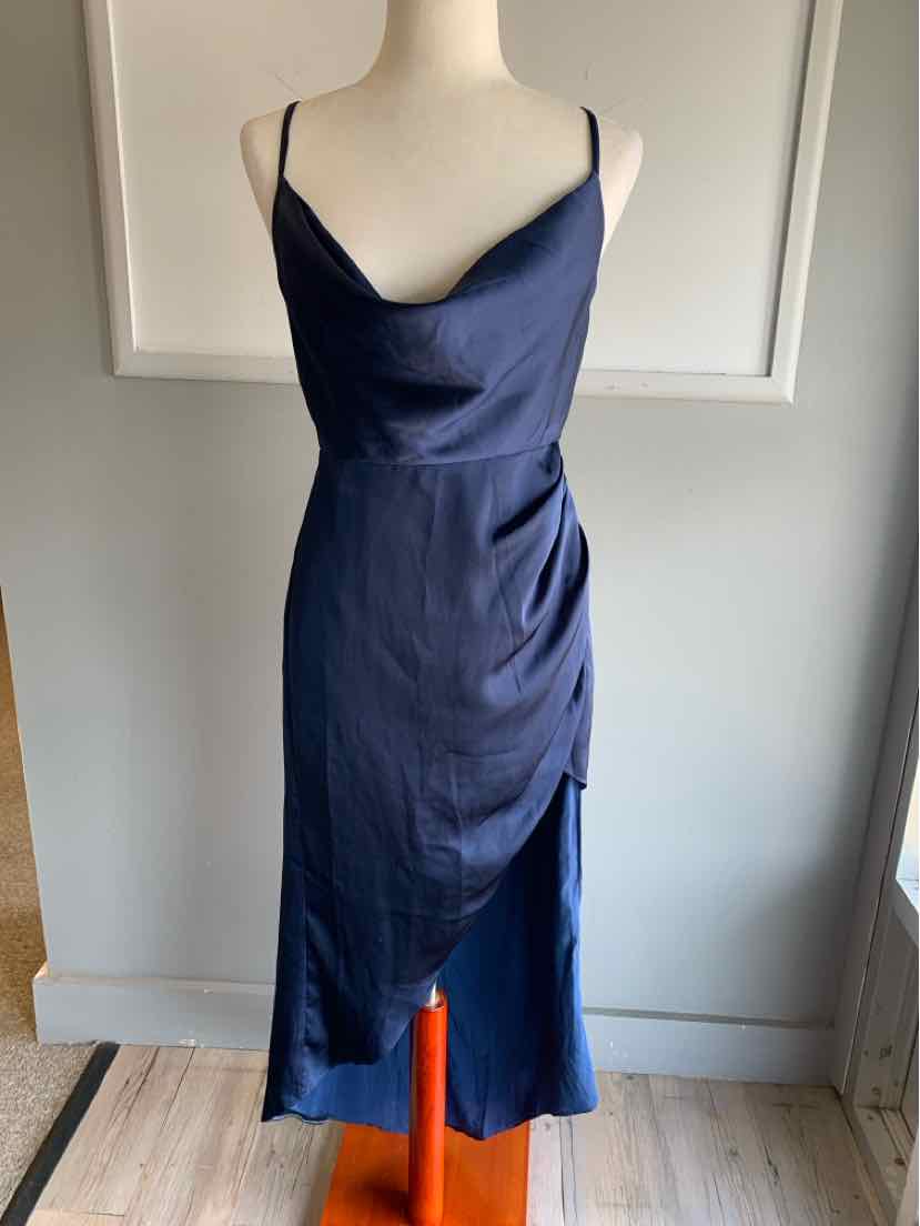 Navy blue satin slip dress with spaghetti straps and a draped V-neckline.