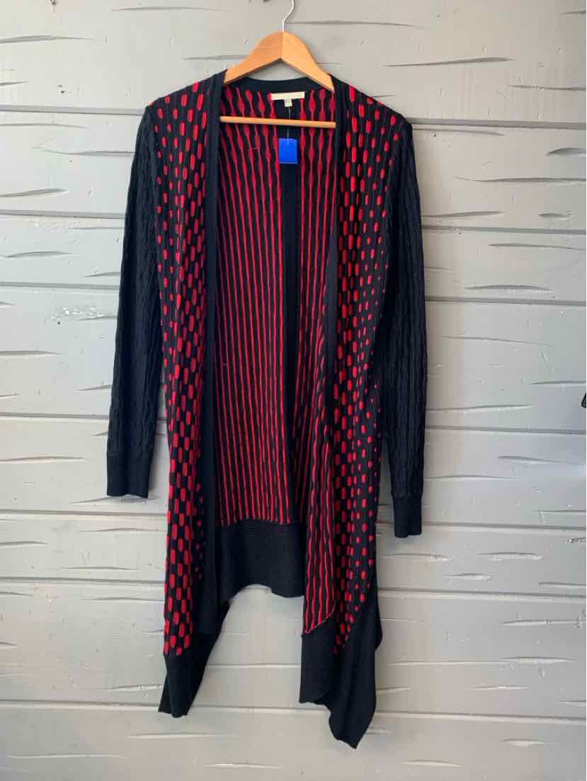Women's long red and navy open-front knit cardigan with a geometric pattern and draped hem.