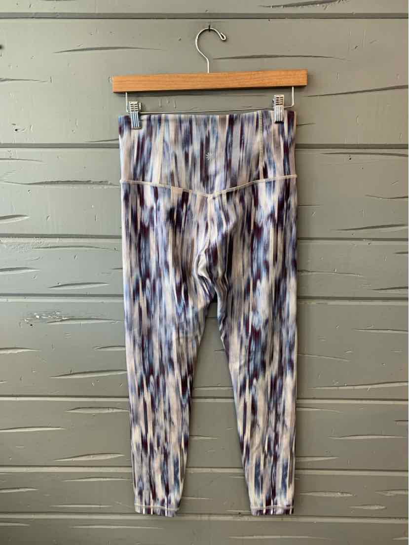 High-waisted women's leggings with blue, gray, and white vertical stripe pattern and a wide waistband.