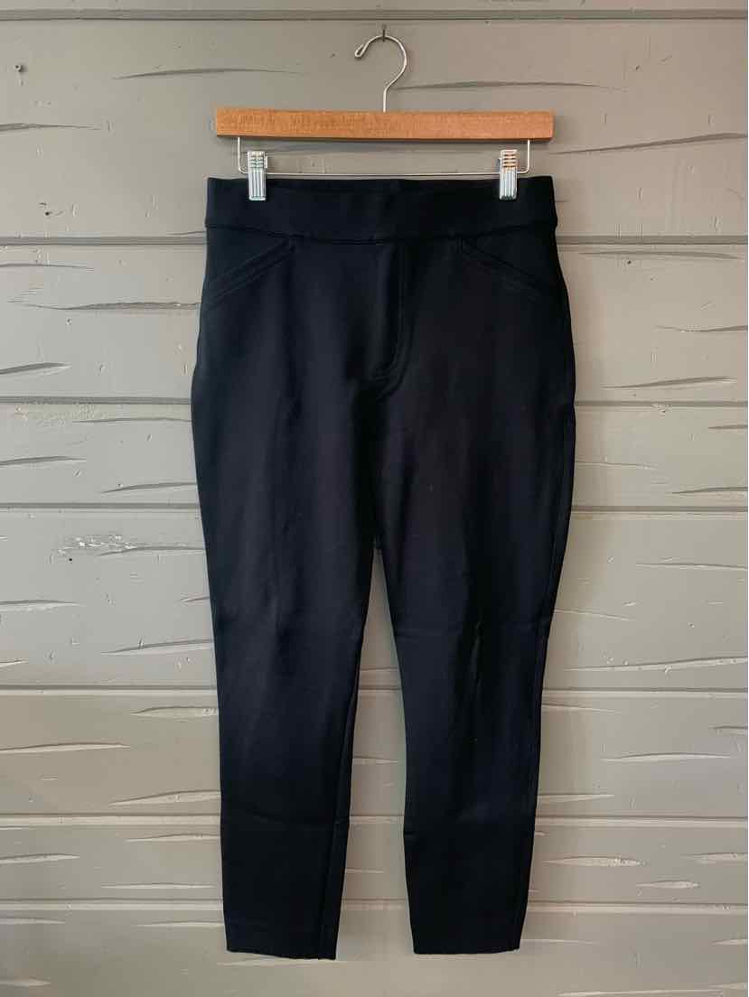 Black high-waisted leggings with a smooth, stretchy fabric and a fitted ankle length.