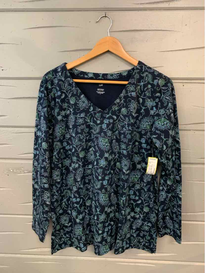 Long-sleeve navy blue floral blouse with V-neck and relaxed fit on wooden hanger.