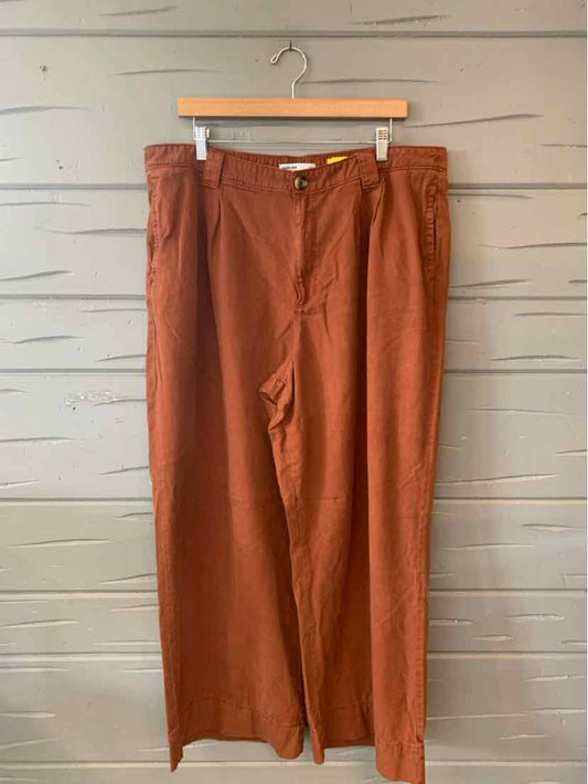 Rust-colored linen blend wide-leg pants with front pockets and zipper fly in size XXL.
