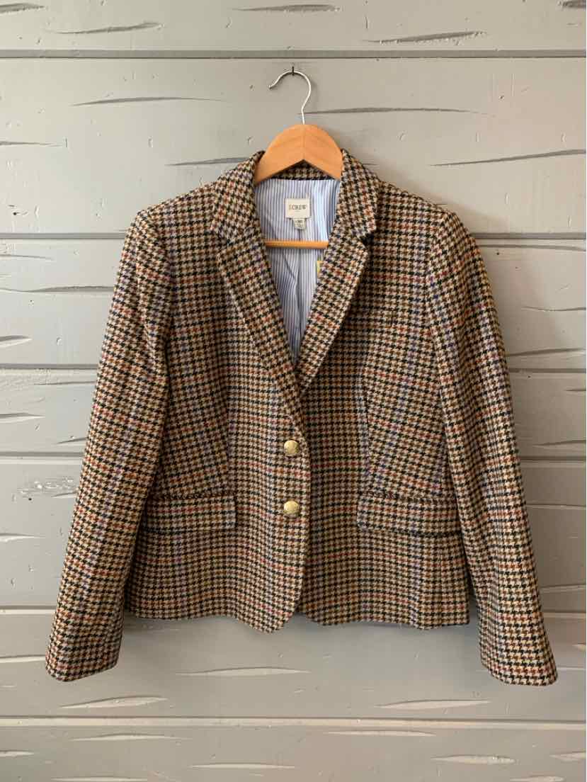 Brown and beige houndstooth blazer with notched lapels and two front buttons, size 12P.