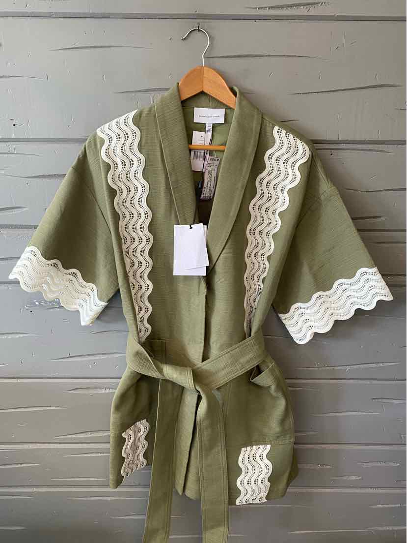 Olive green kimono robe with white wavy trim on sleeves, front edges, and pockets, belted waist, mid-length.