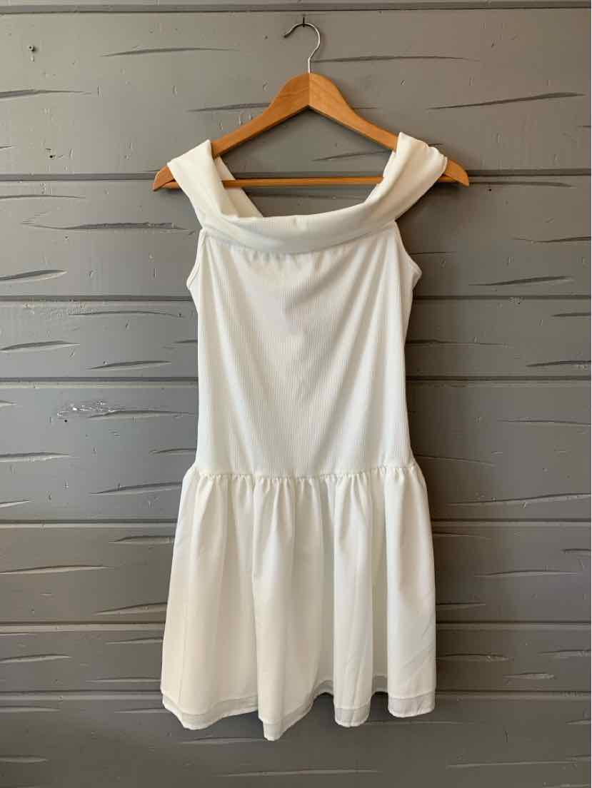 White sleeveless dress with wide straps, fitted bodice, and gathered skirt in lightweight fabric.