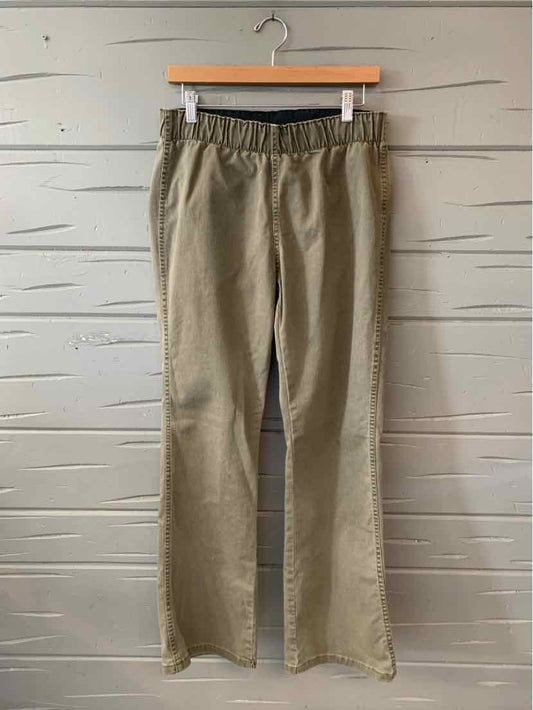 Light olive green relaxed-fit pants with elastic waistband and straight legs hanging on wooden hanger.