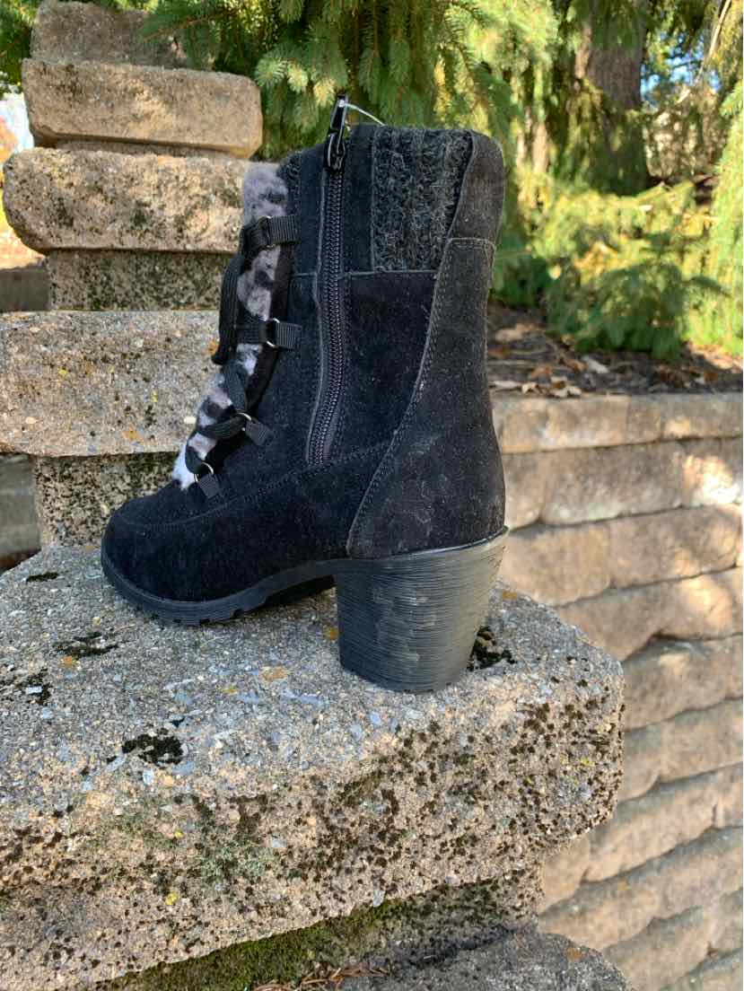 Black MUK LUKS ankle boot with plush lining, lace-up front, side zipper, and chunky block heel.