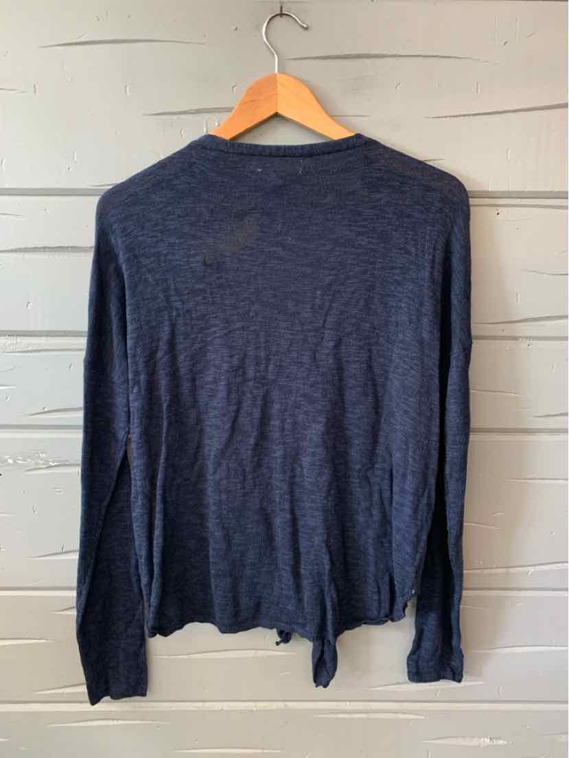 Navy blue long-sleeve lightweight sweater with crew neckline on wooden hanger.